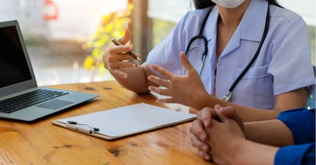 doctor with test results