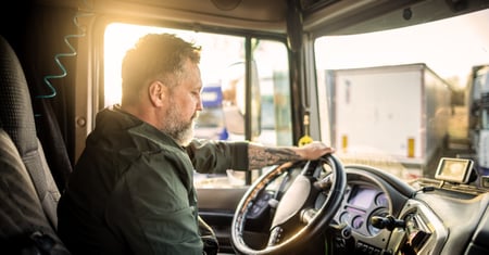 truck driver behind wheel