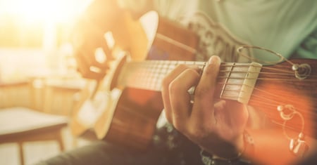 man playing guitar