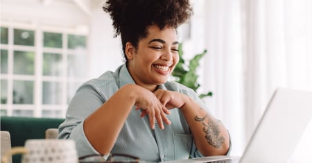 happy woman with laptop