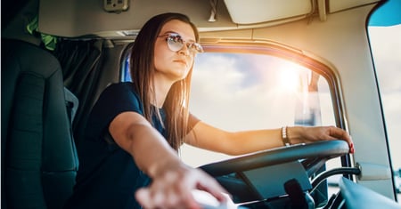 young female driver behind wheel